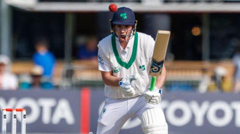 Ireland's Reuben Wilson turns down a single after he defends a ball during their Test against New Zealand