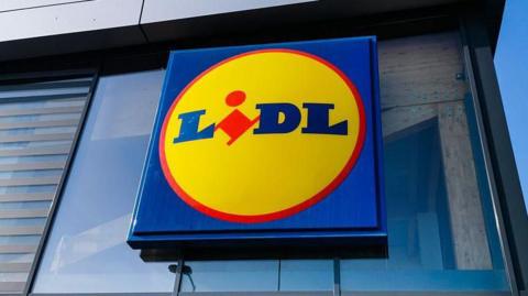 A red, yellow and blue sign that reads 'Lidl' 