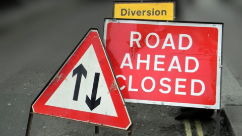 A road closure sign