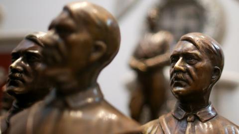 Busts of Adolf Hitler are displayed during a news conference at the Holocaust museum in Buenos Aires, Argentina.