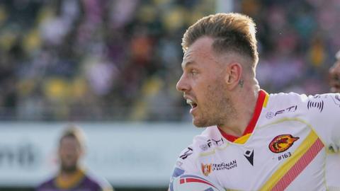 Tom Johnstone on the way to scoring a try for Catalans Dragons