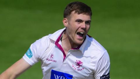 Kasey Aldridge celebrates taking a Championship wicket for Somerset