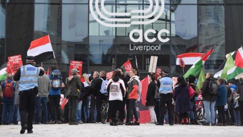 Protesters against the arms conference in Liverpool
