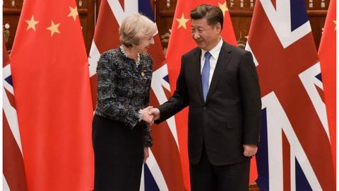 Theresa May meeting Chinese President Xi Jinping in 2016