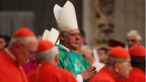 Newly elected cardinal Gerhard Ludwig Muller of Germany arrives during a consistory ceremony led by Pope Francis in Saint Peter"s Basilica at the Vatican February 22, 2014.