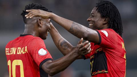 Gelson Dala and Mabululu celebrate a goal for Angola against Namibia at the 2023 Africa Cup of Nations