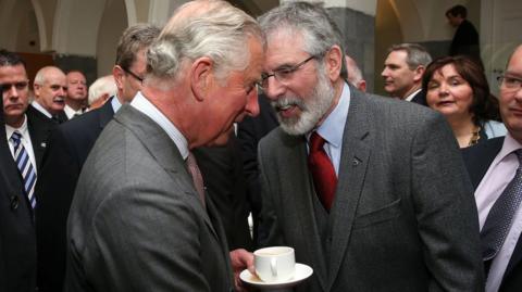 King Charles, who was then Prince Charles, shakes hands with then Sinn Féin president Gerry Adams in Galway in 2015