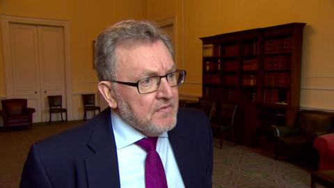 David Mundell says he will stay on as Scottish Secretary
