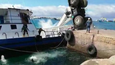 The boat was carrying 600 gallons of diesel when a crane collapsed, causing it to sink.