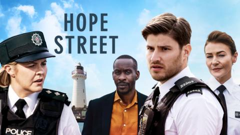 3 police officers and a detective stand in front of a lighthouse