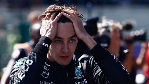 Mercedes driver George Russell runs his hands through his hair after the Belgian GP