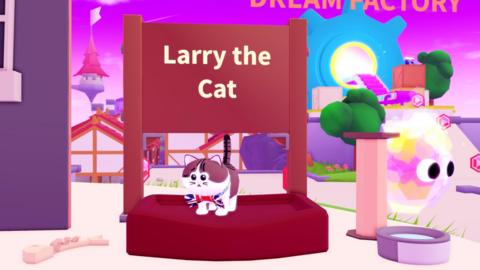 A cartoon cat with a bowtie printed with the flag of Great Britain is stood on a podium that says 'Larry the Cat'