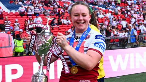 Mary Coleman, holding the Women's Challenge Cup