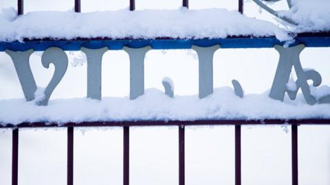 Snowy gates at Villa Park