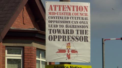 A protesting against the council