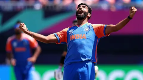 Jasprit Bumrah celebrates a wicket