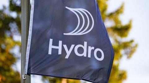 Norsk Hydro logo on a company flag