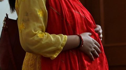 A pregnant Indian woman