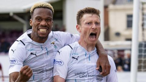 Shane Sutherland (right) celebrates his goal