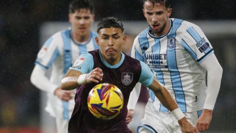 Burnley's Jeremy Sarmiento chases the ball pursued by Middlesbrough players