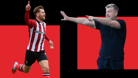 Lincoln striker James Collins celebrates while Salford City boss Karl Robinson gesticulates to his players