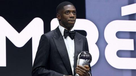 Ousmane Dembele on stage with the men's player of the year trophy at the Fifa Best Awards 2025 in Doha