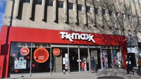 The front of the building when it was a TK Maxx, with the red and white signage on the front.