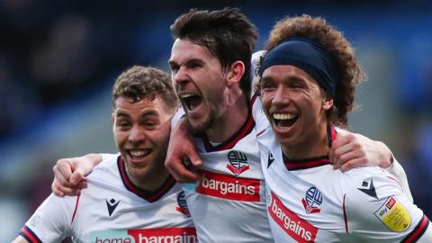 Bolton celebrate their 6-0 win against Sunderland.