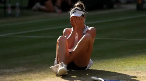 Karolina Muchova hits a forehand