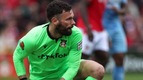 Ben Foster gathers the ball