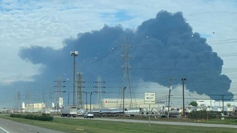 A plume of smoke is seen above the chemical plant