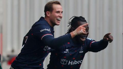 Max Malins celebrates Bristol's first try with Gabriel Ibitoye