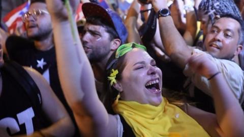 People celebrating Governor Ricardo Rosselló's resignation in Puerto Rico