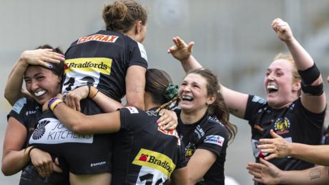 Exeter celebrate a try against Saracens