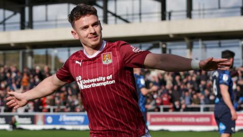 Sam Hoskins scores for Northampton against Derby