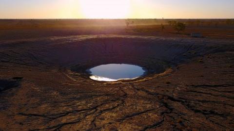 A pond on a farm in New South Wales that is almost dry
