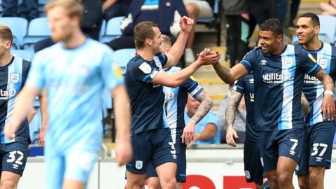 Huddersfield Town's Tino Anjorin celebrates scoring against Coventry