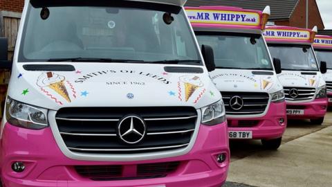 A row of ice cream vans