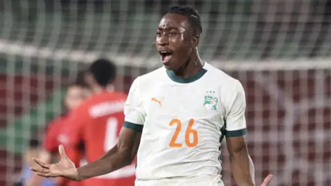 Yan Diomande celebrates a goal for Ivory Coast