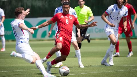 Wales' Kai Andrews in action against Norway