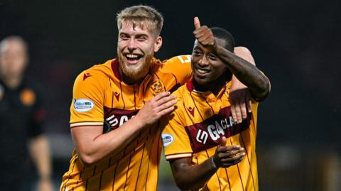 Ewan Murray and Tawanda Maswanhise celebrate