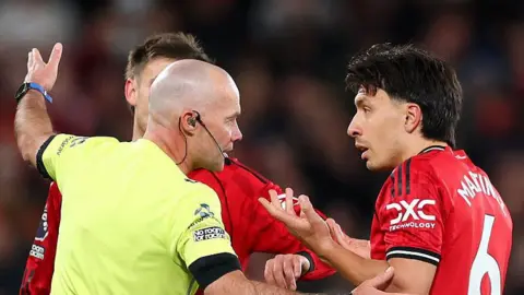 Martinez dismissed for Man Utd