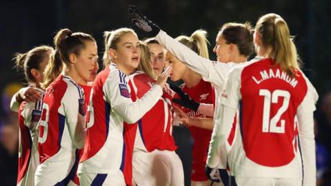 Alessia Russo (centre) celebrates scoring for Arsenal against Everton in the Women's Super League.