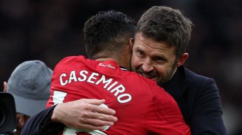Michael Carrick hugs Casemiro during Manchester United's 2-0 win over Manchester City