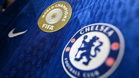 A close-up shot of a Chelsea shirt featuring club badge, Nike logo and Fifa Club World Cup winners' emblem