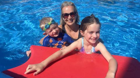 Kerry Barlow with children Summer and Seth at the outdoor pool at Stonehaven in Aberdeenshire