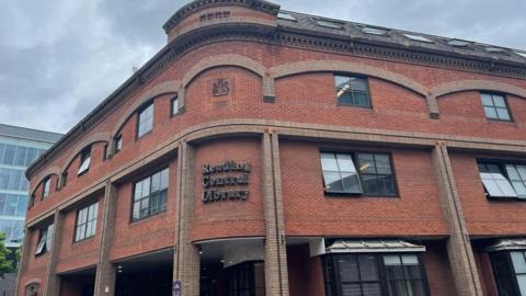 Large brick library building.
