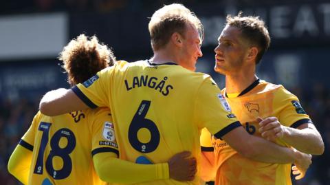 Derby celebrate