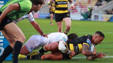 Paul Vaughan diving over the try line