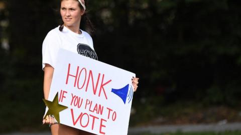 'honk if you plan to vote' sign in Atlanta